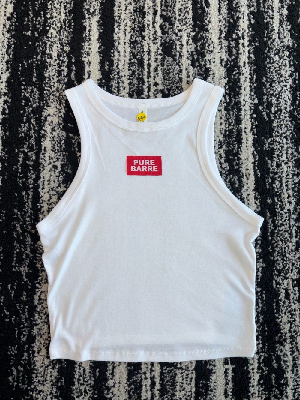 Pure Barre White Ribbed Crop Tank with Red Logo Patch